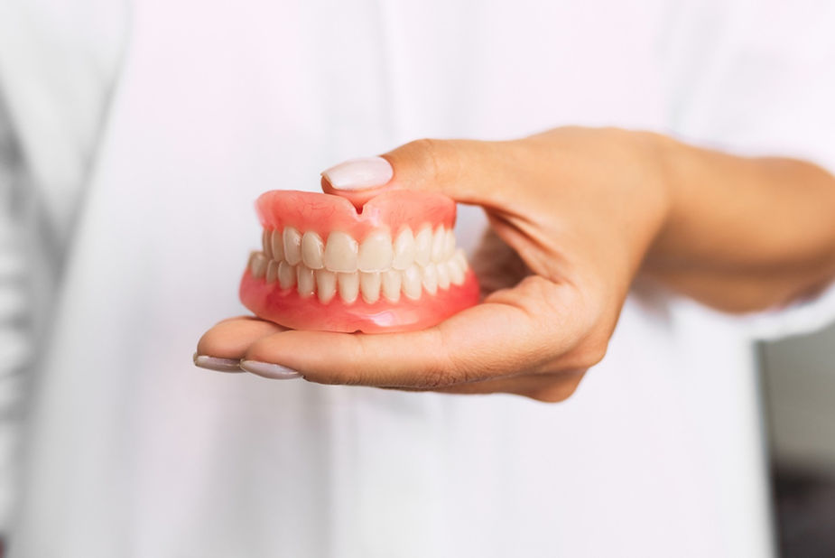 What options are available for dentures?
