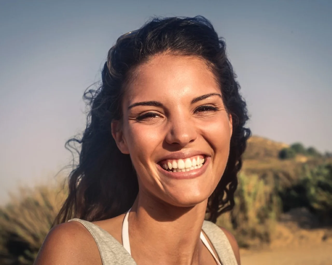 Woman smiling on a sunny day